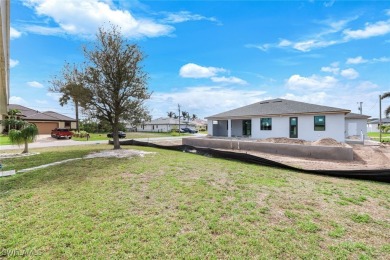 SW Cape Coral Home with room for everyone 4 Bedrooms 2 Full on Palmetto-Pine Country Club in Florida - for sale on GolfHomes.com, golf home, golf lot