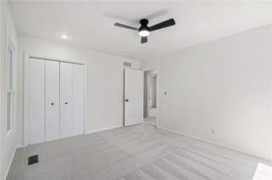 Looking for a better-than-brand-new home? This fully remodeled on National Golf Club of Kansas City in Missouri - for sale on GolfHomes.com, golf home, golf lot