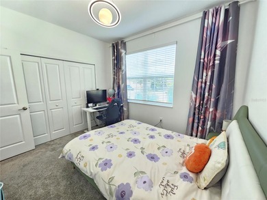 Built in 2024, this 4 bedroom / 3 bathroom Newcastle model on The Oasis Club at Champions Gate in Florida - for sale on GolfHomes.com, golf home, golf lot