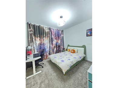 Built in 2024, this 4 bedroom / 3 bathroom Newcastle model on The Oasis Club at Champions Gate in Florida - for sale on GolfHomes.com, golf home, golf lot