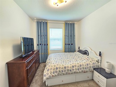 Built in 2024, this 4 bedroom / 3 bathroom Newcastle model on The Oasis Club at Champions Gate in Florida - for sale on GolfHomes.com, golf home, golf lot