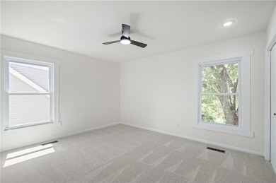 Looking for a better-than-brand-new home? This fully remodeled on National Golf Club of Kansas City in Missouri - for sale on GolfHomes.com, golf home, golf lot