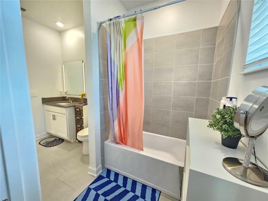 Built in 2024, this 4 bedroom / 3 bathroom Newcastle model on The Oasis Club at Champions Gate in Florida - for sale on GolfHomes.com, golf home, golf lot