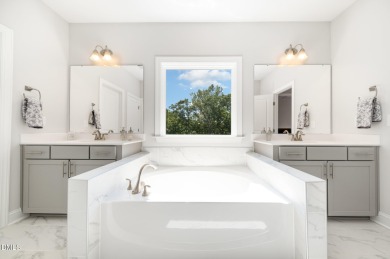 Tucked at the end of a peaceful cul-de-sac in the coveted Legacy on The Preserve At Jordan Lake Golf Club in North Carolina - for sale on GolfHomes.com, golf home, golf lot
