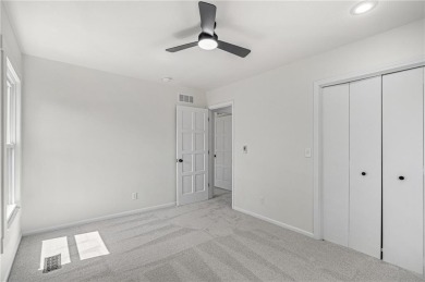 Looking for a better-than-brand-new home? This fully remodeled on National Golf Club of Kansas City in Missouri - for sale on GolfHomes.com, golf home, golf lot