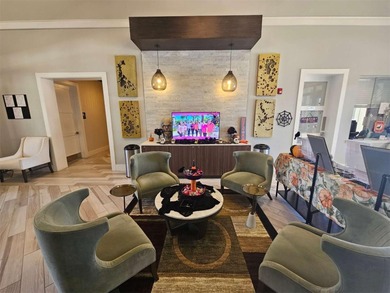 Built in 2024, this 4 bedroom / 3 bathroom Newcastle model on The Oasis Club at Champions Gate in Florida - for sale on GolfHomes.com, golf home, golf lot