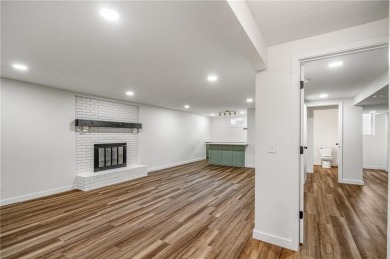 Looking for a better-than-brand-new home? This fully remodeled on National Golf Club of Kansas City in Missouri - for sale on GolfHomes.com, golf home, golf lot