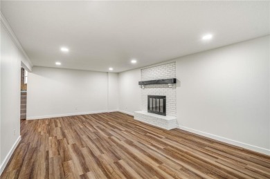 Looking for a better-than-brand-new home? This fully remodeled on National Golf Club of Kansas City in Missouri - for sale on GolfHomes.com, golf home, golf lot