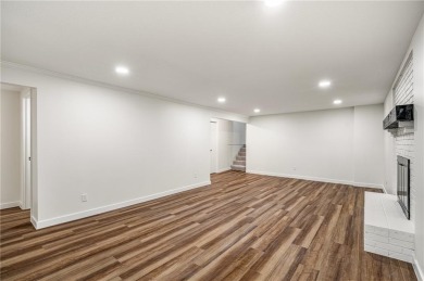 Looking for a better-than-brand-new home? This fully remodeled on National Golf Club of Kansas City in Missouri - for sale on GolfHomes.com, golf home, golf lot
