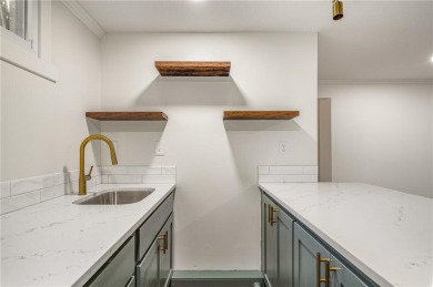Looking for a better-than-brand-new home? This fully remodeled on National Golf Club of Kansas City in Missouri - for sale on GolfHomes.com, golf home, golf lot
