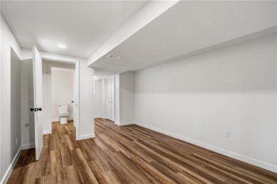 Looking for a better-than-brand-new home? This fully remodeled on National Golf Club of Kansas City in Missouri - for sale on GolfHomes.com, golf home, golf lot