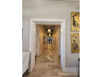 Built in 2024, this 4 bedroom / 3 bathroom Newcastle model on The Oasis Club at Champions Gate in Florida - for sale on GolfHomes.com, golf home, golf lot