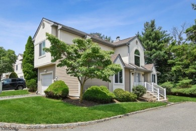 Experience elevated living in this sun-drenched, end-unit on Echo Lake Country Club in New Jersey - for sale on GolfHomes.com, golf home, golf lot