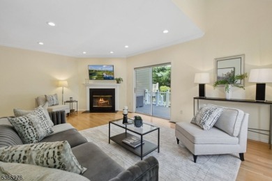 Experience elevated living in this sun-drenched, end-unit on Echo Lake Country Club in New Jersey - for sale on GolfHomes.com, golf home, golf lot