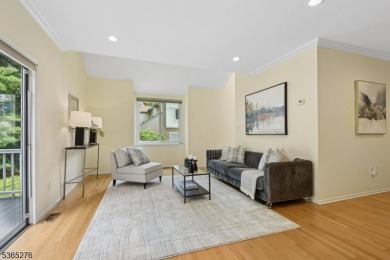 Experience elevated living in this sun-drenched, end-unit on Echo Lake Country Club in New Jersey - for sale on GolfHomes.com, golf home, golf lot