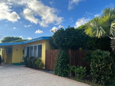 Kitchen, bathroom, floors & ceilings have been tastefully on Fort Lauderdale Country Club in Florida - for sale on GolfHomes.com, golf home, golf lot