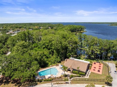 Introducing a beautiful one-bedroom, one-bath condominium that on Highland Lakes Executive Golf Course in Florida - for sale on GolfHomes.com, golf home, golf lot