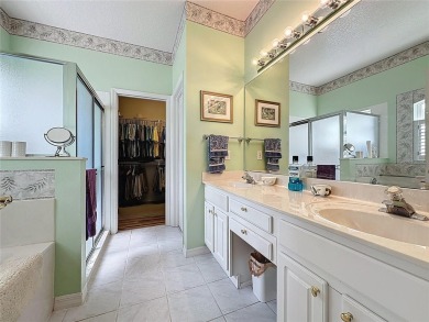 This very popular St Laurent model by the 7th hole of the Kings on Kings Ridge Golf Club in Florida - for sale on GolfHomes.com, golf home, golf lot