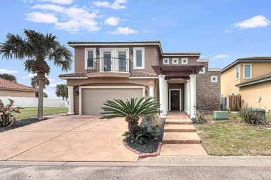 Experience coastal living at its finest in this stunning on Palmilla Beach Golf Club in Texas - for sale on GolfHomes.com, golf home, golf lot