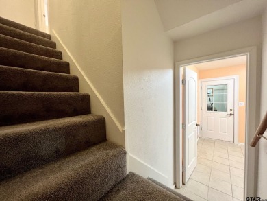 Sit on the front porch of this spacious, charming house and on Holly Lake Ranch Golf Club in Texas - for sale on GolfHomes.com, golf home, golf lot