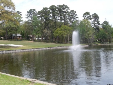 Sit on the front porch of this spacious, charming house and on Holly Lake Ranch Golf Club in Texas - for sale on GolfHomes.com, golf home, golf lot