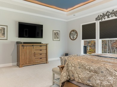 Experience luxury living in this stunning David Weekley home on Westport Golf Club in North Carolina - for sale on GolfHomes.com, golf home, golf lot