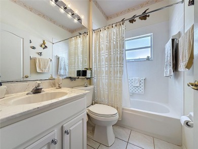 This very popular St Laurent model by the 7th hole of the Kings on Kings Ridge Golf Club in Florida - for sale on GolfHomes.com, golf home, golf lot