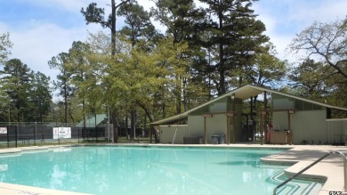 Sit on the front porch of this spacious, charming house and on Holly Lake Ranch Golf Club in Texas - for sale on GolfHomes.com, golf home, golf lot