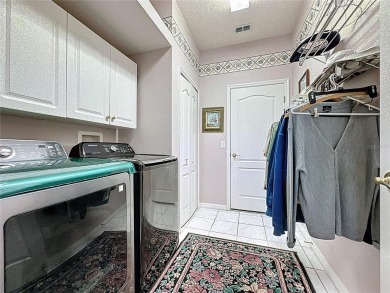 This very popular St Laurent model by the 7th hole of the Kings on Kings Ridge Golf Club in Florida - for sale on GolfHomes.com, golf home, golf lot