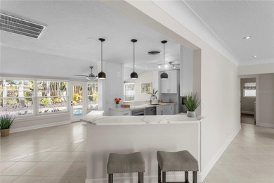 One or more photo(s) has been virtually staged. Discover this on Pasadena Yacht and Country Club in Florida - for sale on GolfHomes.com, golf home, golf lot