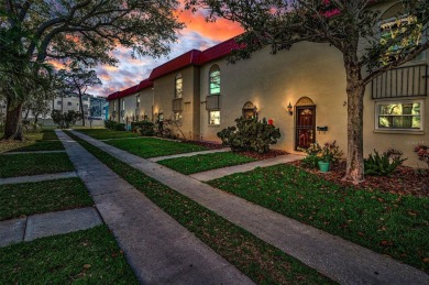 WELCOME TO DUNEDIN'S WATERFRONT COMMUNITY OF MEDITERRANEAN on The Dunedin Country Club in Florida - for sale on GolfHomes.com, golf home, golf lot