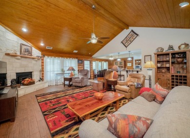 This stunning log cabin features 3 bedrooms, 2 bathrooms, and on Lago Vista Golf Club in Texas - for sale on GolfHomes.com, golf home, golf lot