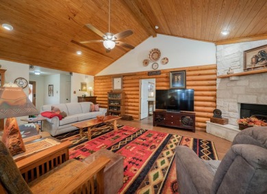 This stunning log cabin features 3 bedrooms, 2 bathrooms, and on Lago Vista Golf Club in Texas - for sale on GolfHomes.com, golf home, golf lot