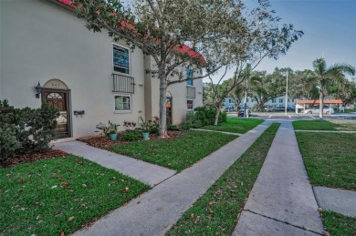 WELCOME TO DUNEDIN'S WATERFRONT COMMUNITY OF MEDITERRANEAN on The Dunedin Country Club in Florida - for sale on GolfHomes.com, golf home, golf lot