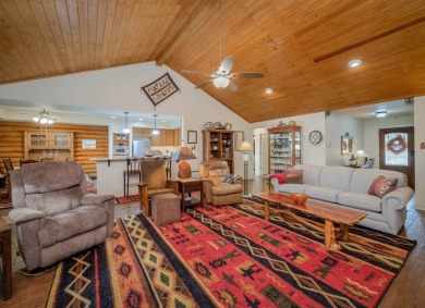 This stunning log cabin features 3 bedrooms, 2 bathrooms, and on Lago Vista Golf Club in Texas - for sale on GolfHomes.com, golf home, golf lot