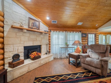 This stunning log cabin features 3 bedrooms, 2 bathrooms, and on Lago Vista Golf Club in Texas - for sale on GolfHomes.com, golf home, golf lot