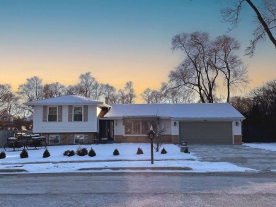 This exquisite, four-bedroom home, nestled in a serene Downers on Green Meadows Golf Club in Illinois - for sale on GolfHomes.com, golf home, golf lot