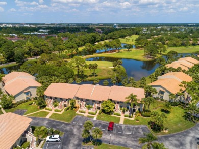 First-floor end-unit turnkey-furnished condo with lake and golf on The Meadows Golf and Country Club in Florida - for sale on GolfHomes.com, golf home, golf lot