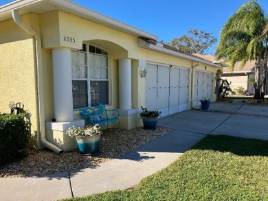 This villa is a MUST SEE... Large open floor plan (living on Summertree Golf Course in Florida - for sale on GolfHomes.com, golf home, golf lot