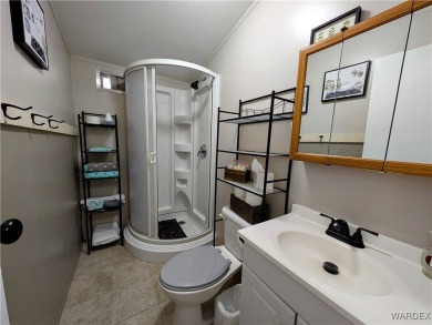Spacious 1 bedroom 1 bath home. Newly renovated with new paint on Riverview Golf Course in Arizona - for sale on GolfHomes.com, golf home, golf lot
