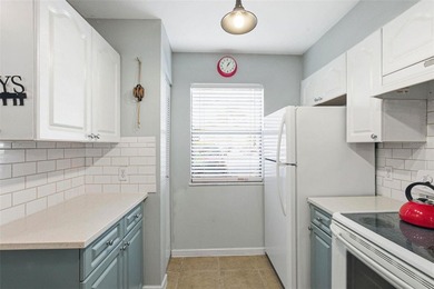 Welcome to this beautifully updated, furnished first-floor condo on St. Petersburg Country Club in Florida - for sale on GolfHomes.com, golf home, golf lot