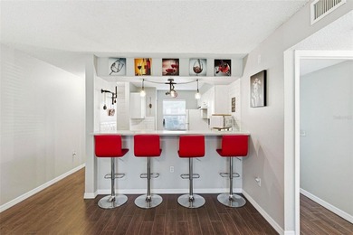 Welcome to this beautifully updated, furnished first-floor condo on St. Petersburg Country Club in Florida - for sale on GolfHomes.com, golf home, golf lot