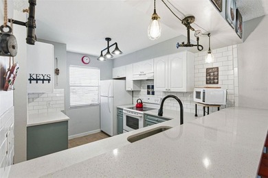 Welcome to this beautifully updated, furnished first-floor condo on St. Petersburg Country Club in Florida - for sale on GolfHomes.com, golf home, golf lot