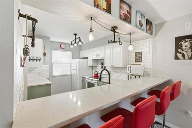 Welcome to this beautifully updated, furnished first-floor condo on St. Petersburg Country Club in Florida - for sale on GolfHomes.com, golf home, golf lot