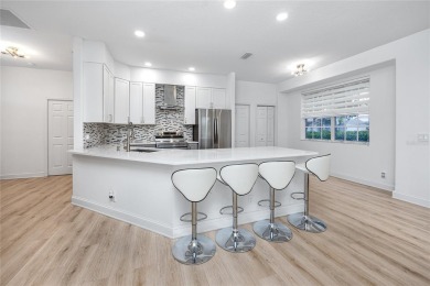 Welcome to Balintore, a charming and secluded single-family home on Lansbrook Golf Club in Florida - for sale on GolfHomes.com, golf home, golf lot
