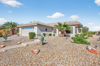 This beautifully remodeled Willow floor plan features walnut on Sun City Grand Golf Couse and Club in Arizona - for sale on GolfHomes.com, golf home, golf lot