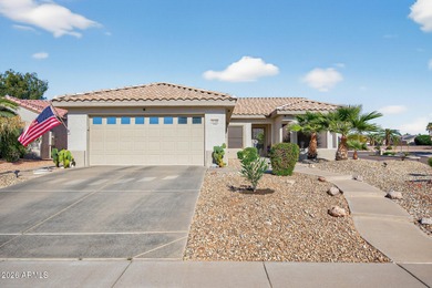 This beautifully remodeled Willow floor plan features walnut on Sun City Grand Golf Couse and Club in Arizona - for sale on GolfHomes.com, golf home, golf lot