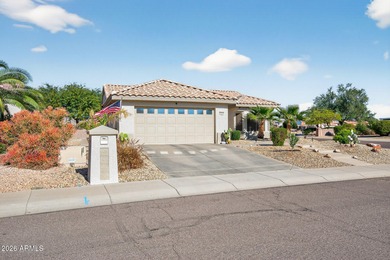 This beautifully remodeled Willow floor plan features walnut on Sun City Grand Golf Couse and Club in Arizona - for sale on GolfHomes.com, golf home, golf lot