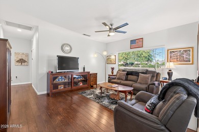 This beautifully remodeled Willow floor plan features walnut on Sun City Grand Golf Couse and Club in Arizona - for sale on GolfHomes.com, golf home, golf lot