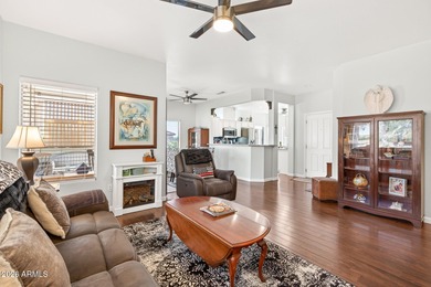 This beautifully remodeled Willow floor plan features walnut on Sun City Grand Golf Couse and Club in Arizona - for sale on GolfHomes.com, golf home, golf lot